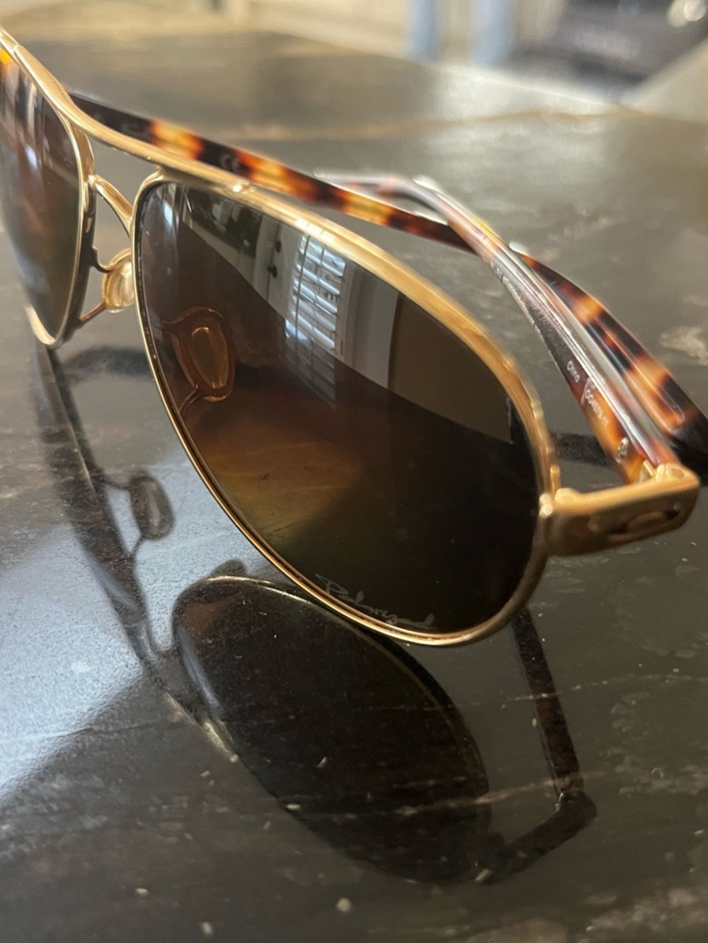 Oakley Feedback Gold Aviator Sunglasses with Tortoise Temples and Brown Lenses
